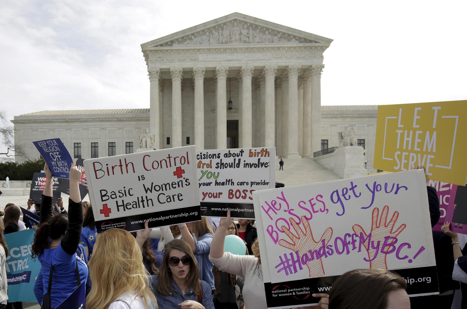 Supporters of contraception rally before Zubik v. Burwell, an appeal brought by Christian groups demanding full exemption from the requirement to provide insurance covering contraception under the Affordable Care Act, is heard by the U.S. Supreme Court. 