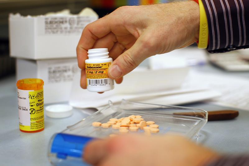 A pharmacist fills a Suboxone prescription at Boston Healthcare for the Homeless Program in Boston, Massachusetts on January 14, 2013. Suboxone is an opiate replacement therapy drug used to help treat opiate cravings and withdrawal.