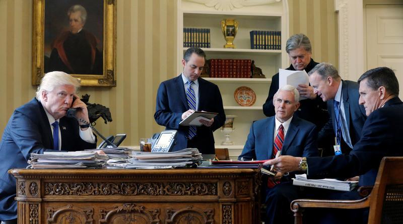 U.S. President Donald Trump speaks by phone with Russia's President Vladimir Putin in the Oval Office at the White House in Washington D.C., January 28, 2017. © 2017 Reuters