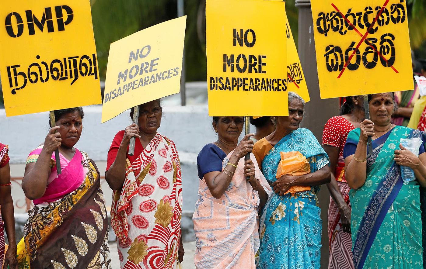 Women conduct a silent protest to commemorate the International Day of the Victims of Enforced Disappearances in Colombo, August 30, 2016. 