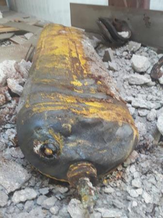 Remnant of yellow gas cylinder that struck a make-shift hospital in al-Lataminah on March 25, 2017 according to a Syria Civil Defense member. Photo shared by © 2017 Abd al-Munaf Faraj al-Saleh