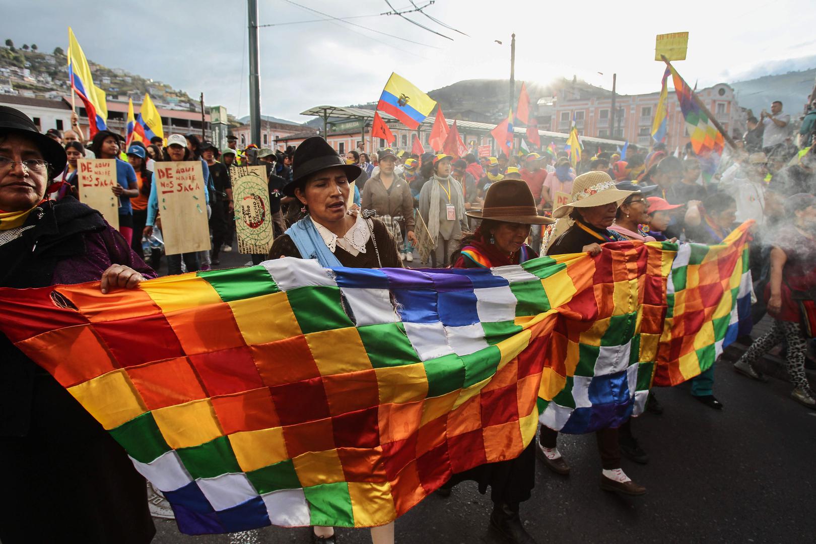 Indigenous people arrive in Quito after marching for 10 days to protest new mining and water law initiatives, as well as a constitutional reform project that would have allowed for indefinite re-election of the president. 