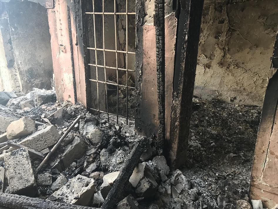 Burned out remains of a room in a damaged house in Mosul’s Old City, following the authorities’ removal of about 80 bodies, April 4, 2018.  © 2018 Belkis Wille/Human Rights Watch