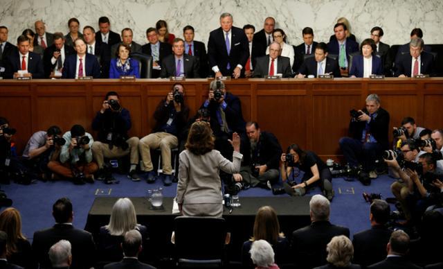 CIA Director nominee Gina Haspel raises her right hand as she is sworn in to testify at her confirmation hearing before the Senate Intelligence Committee on Capitol Hill in Washington, U.S., May 9, 2018. © 2018 REUTERS