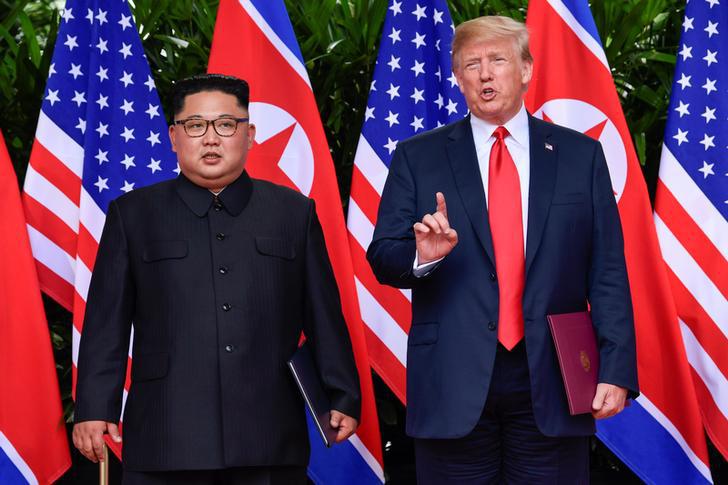 Kim Jong Un and Donald Trump after their meeting in Singapore, June 12, 2018.