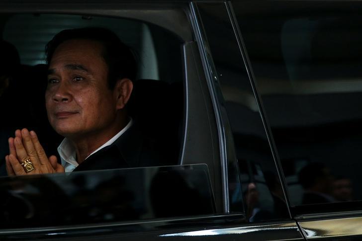 Thailand's Prime Minister Prayuth Chan-ocha gestures as he leaves Thai Union company in Samut Sakhon, Thailand, March 5, 2018. REUTERS/Athit Perawongmetha