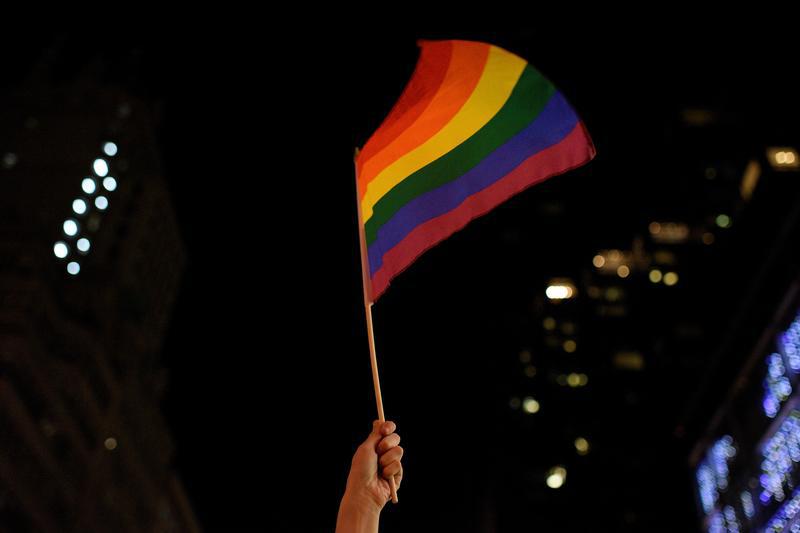 An activist waves a rainbow flag in Manhattan, New York, US, February 26, 2017. 