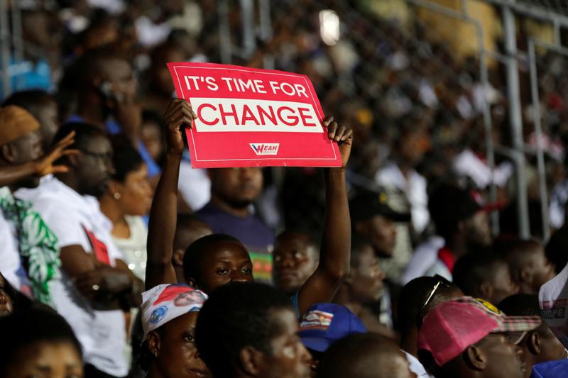 Supporters of George Weah attend a meeting during their party's presidential campaign rally at Samuel Kanyon Doe Sports Complex in Monrovia, Liberia December 23, 201