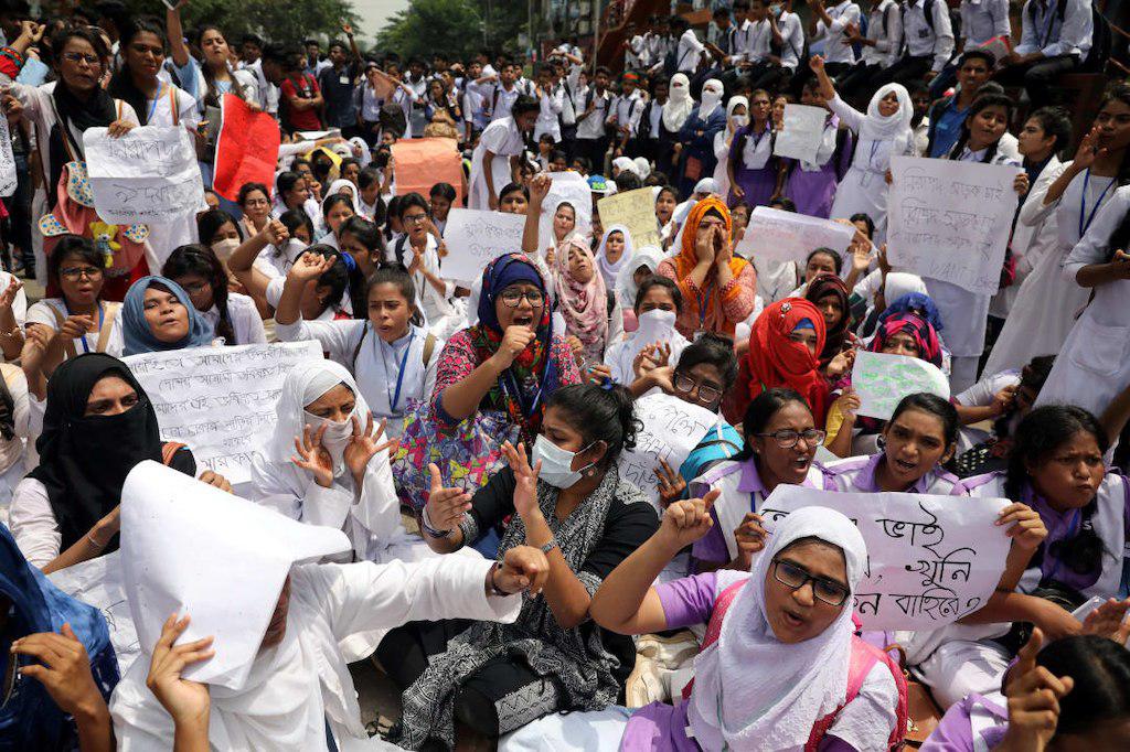 Students shout slogans as they take part in a protest over recent traffic accidents that killed a boy and a girl, in Dhaka, Bangladesh, August 4, 2018. 