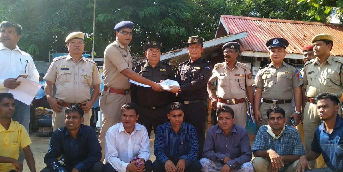 Indian police transfer seven ethnic Rohingya to Myanmar officials in Moreh, Manipur, India, October 4, 2018.