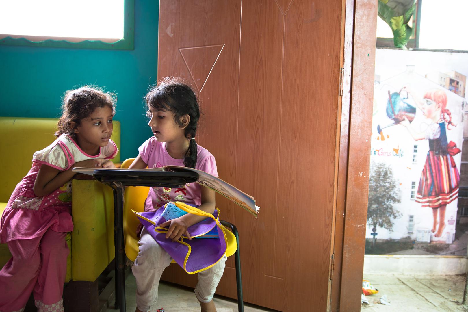 Two students at a free non-government school for poor children in the Lyari neighborhood of Karachi, Pakistan. 