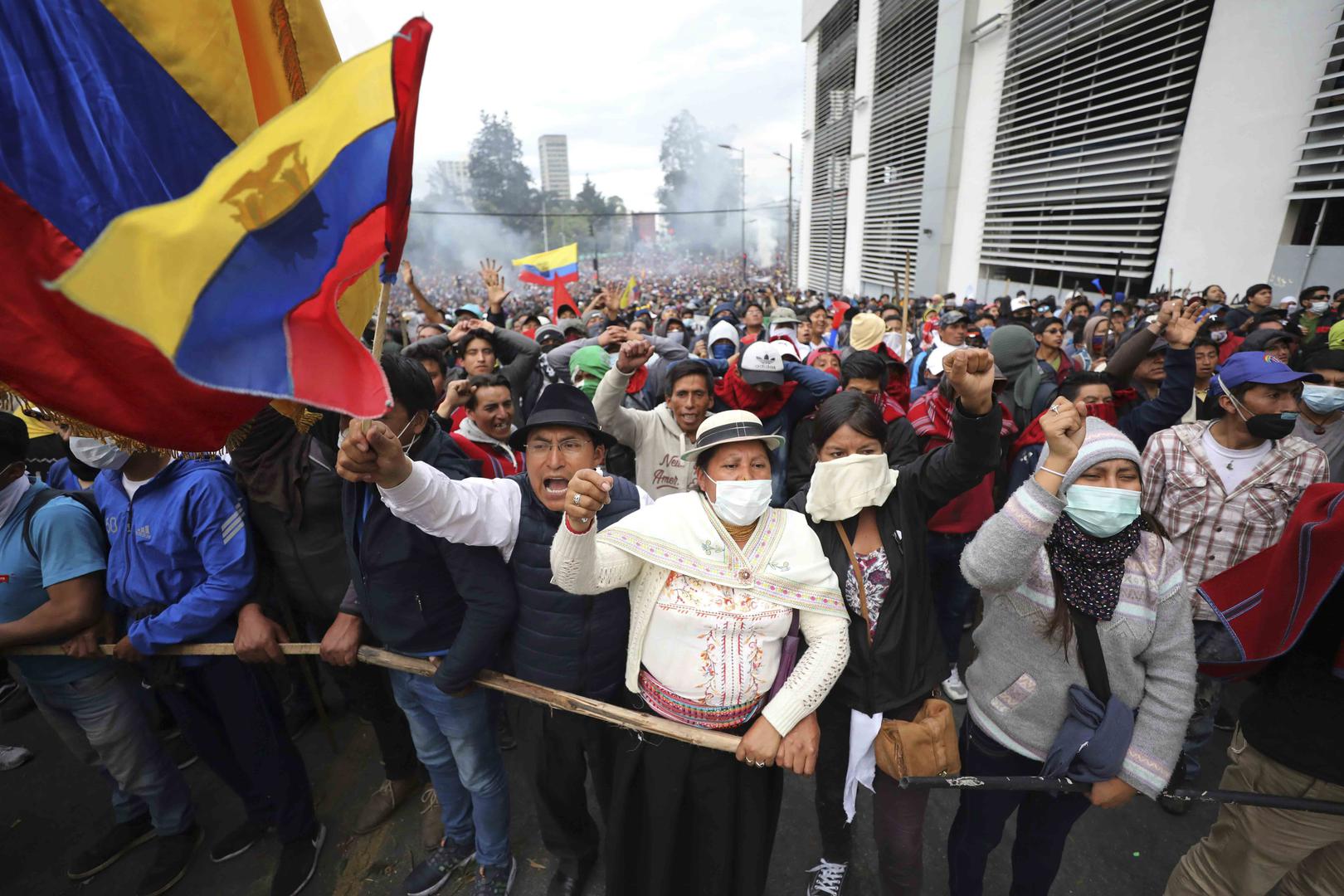 Anti-government demonstrators chant slogans against President Lenin Moreno and his economic policies during a protest in Quito, Ecuador, Tuesday, Oct. 8, 2019.