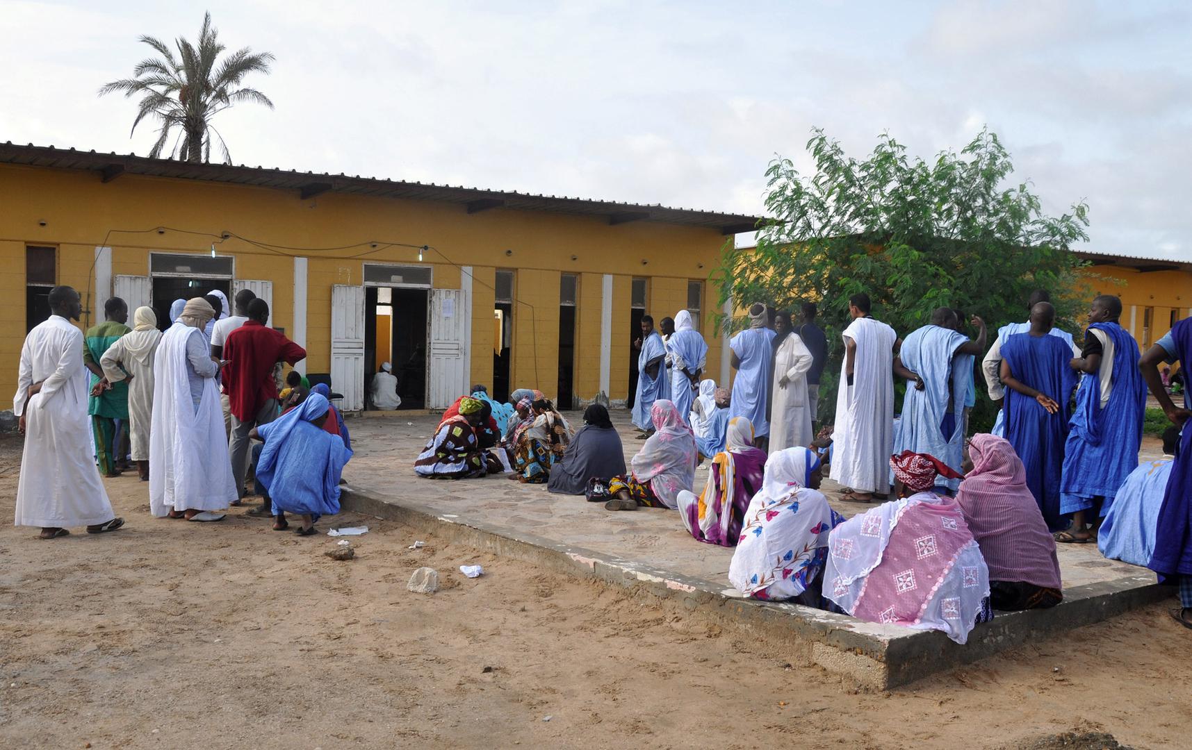 People wait to cast their vote on September 1, 2018 outside a polling station in Nouakchott for the country's legislative, regional and local elections. © 2018 Ahmed Ould Mohamed Ould Elhadj/AFP/Getty Images