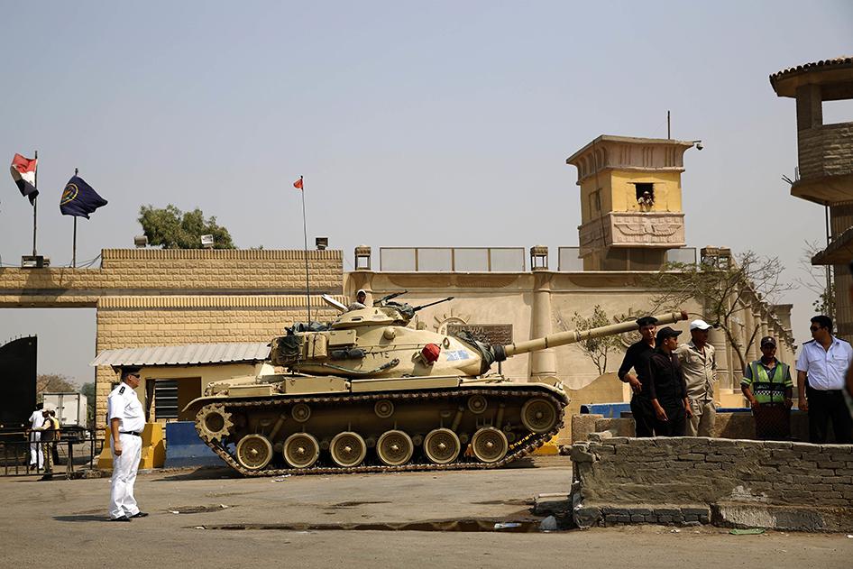 Egyptian security forces have been involved in systematic abuses such as enforced disappearance and torture and have used abusive counterterrorism laws and measures to crush peaceful dissent. Egyptian security forces stand guard outside one of the entranc