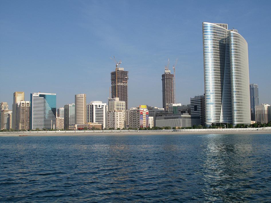 Abu Dhabi Investment Authority building, modern tall buildings on the Corniche seafront, Abu Dhabi, UAE.