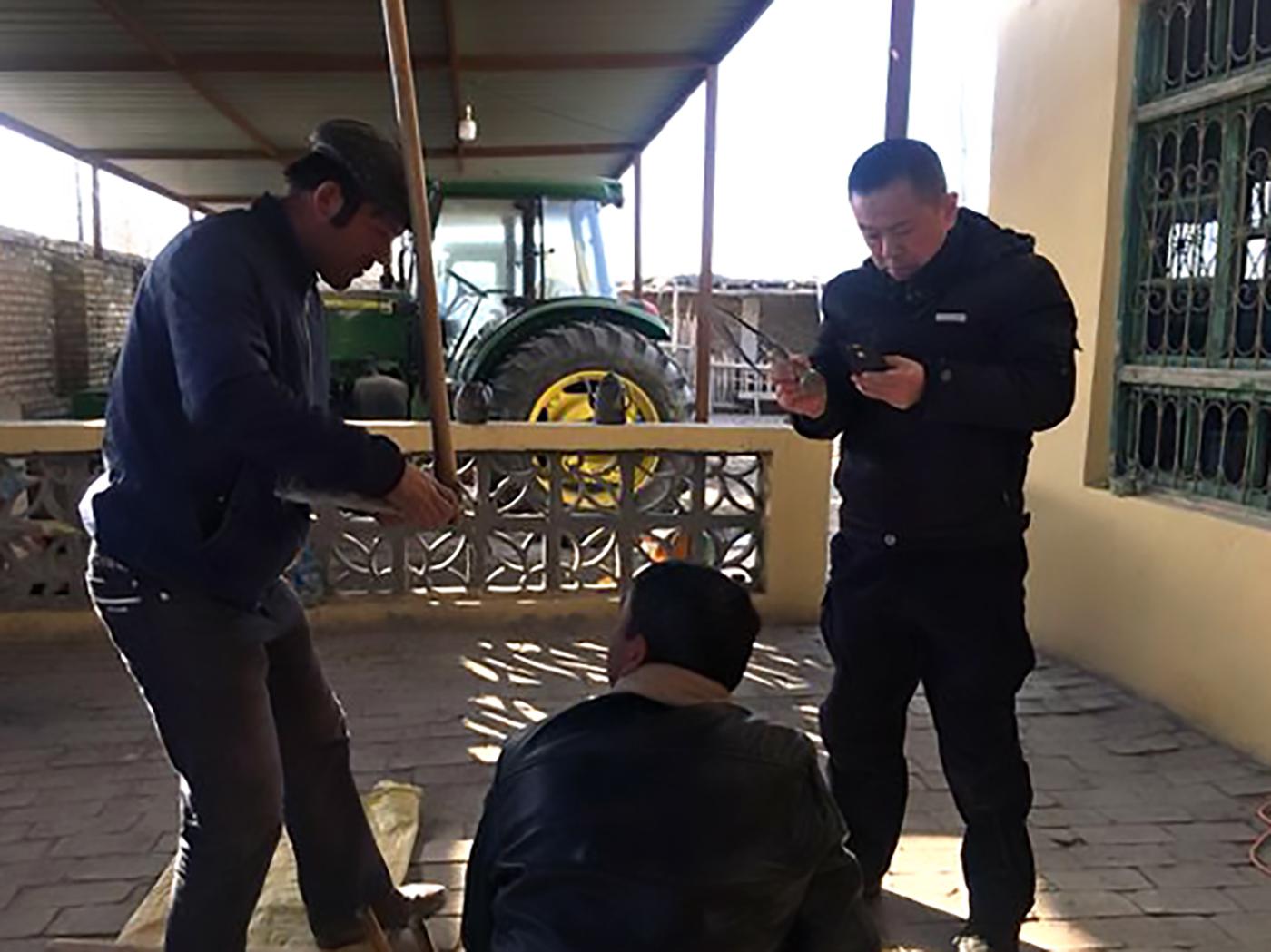 A Xinjiang Police College webpage shows police officers collecting information from villagers in Kargilik (or Yecheng) County in Kashgar Prefecture, Xinjiang. 