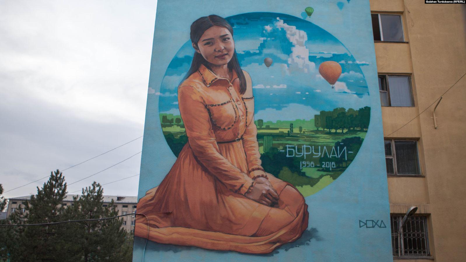 Burulai Turdaaly kyzy’s portrait on a building at the medical college she attended in Bishkek, November 2018.