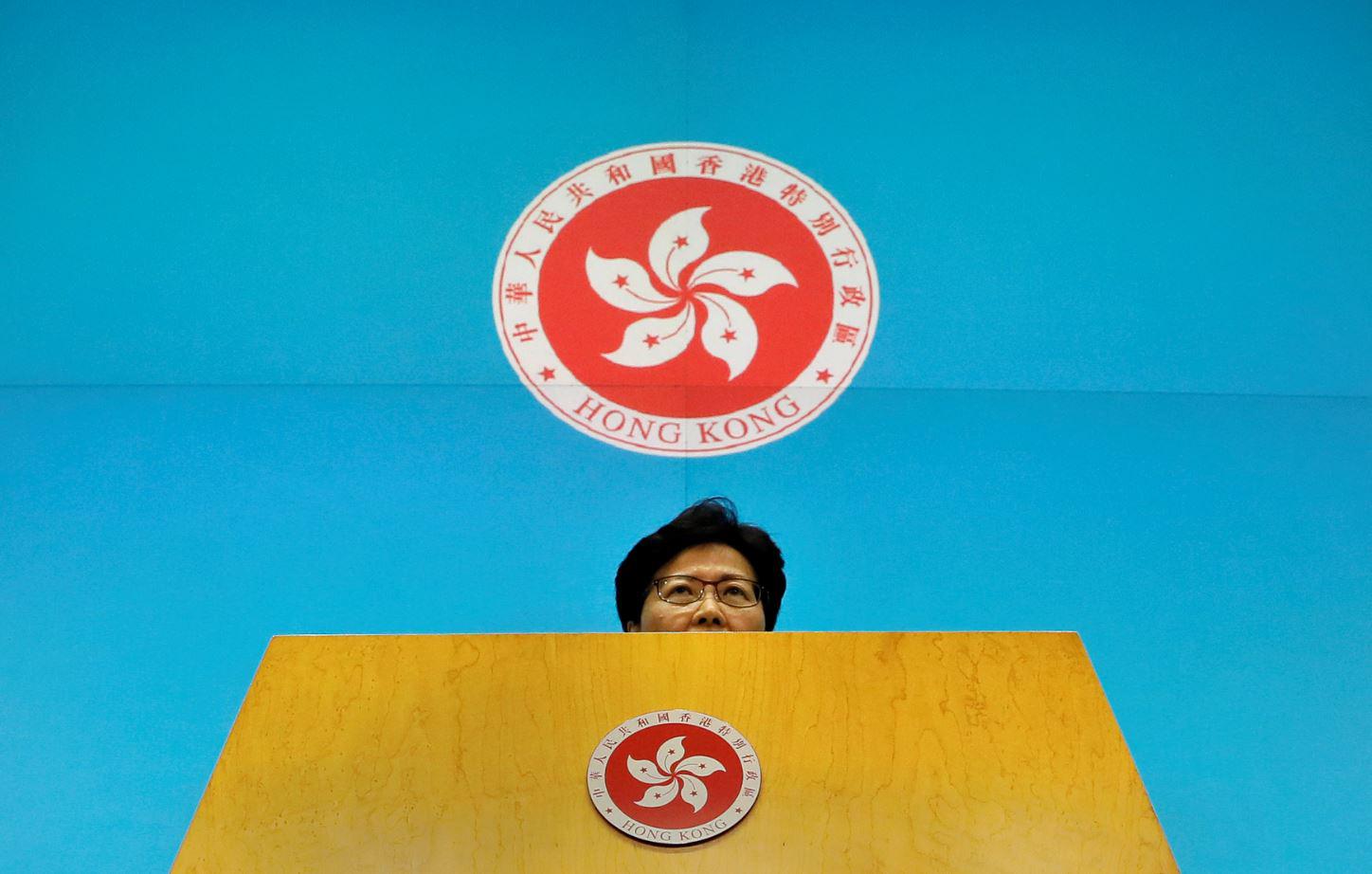 Hong Kong Chief Executive Carrie Lam listens to reporters' questions during a press conference at the Legislative Council in Hong Kong, Tuesday, June 18, 2019. 