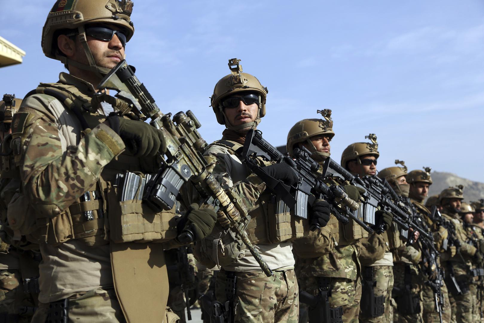 Afghan special police forces attend their graduation ceremony at a special forces training center in Kabul.