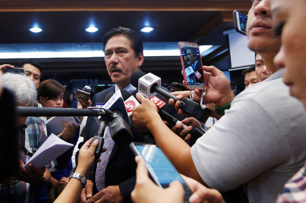 Senate president Vicente Sotto III talks to the media in this May 2018 photo. Sotto, a staunch supporter of President Rodrigo Duterte, filed the bill against "false news" on July 1, 2019. 