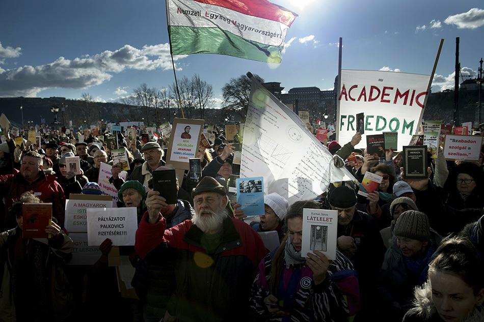 Protesters gather in front of the Hungarian Academy of Sciences (MTA) headquarters to protest against the planned reorganisation of the Hungarian Academy of Sciences in Budapest,