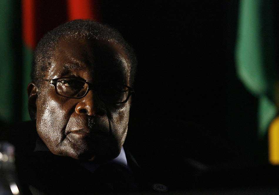 Then-Zimbabwean President Robert Mugabe is seen at the closing ceremony of the 28th Southern African Development Community summit of heads of state and government, in Johannesburg, South Africa.