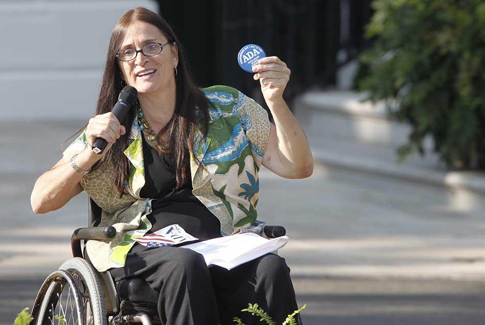 Marca Bristo, President of Access Living, speaks at an event marking the 20th anniversary of the Americans with Disabilites Act in Washington