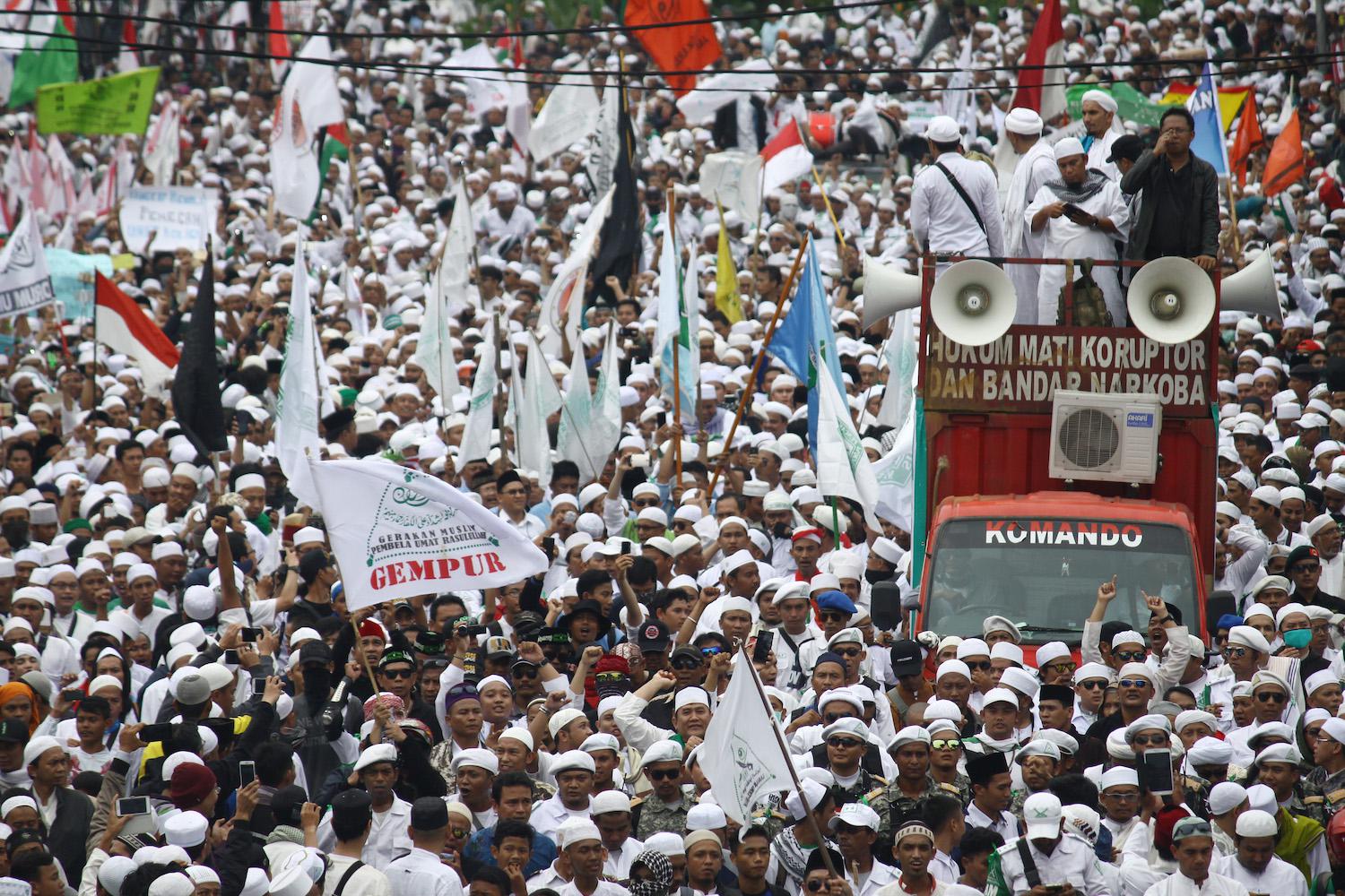 Thousands people from various Islamic organizations marched to the Jakarta Governor Office in October, 2016.