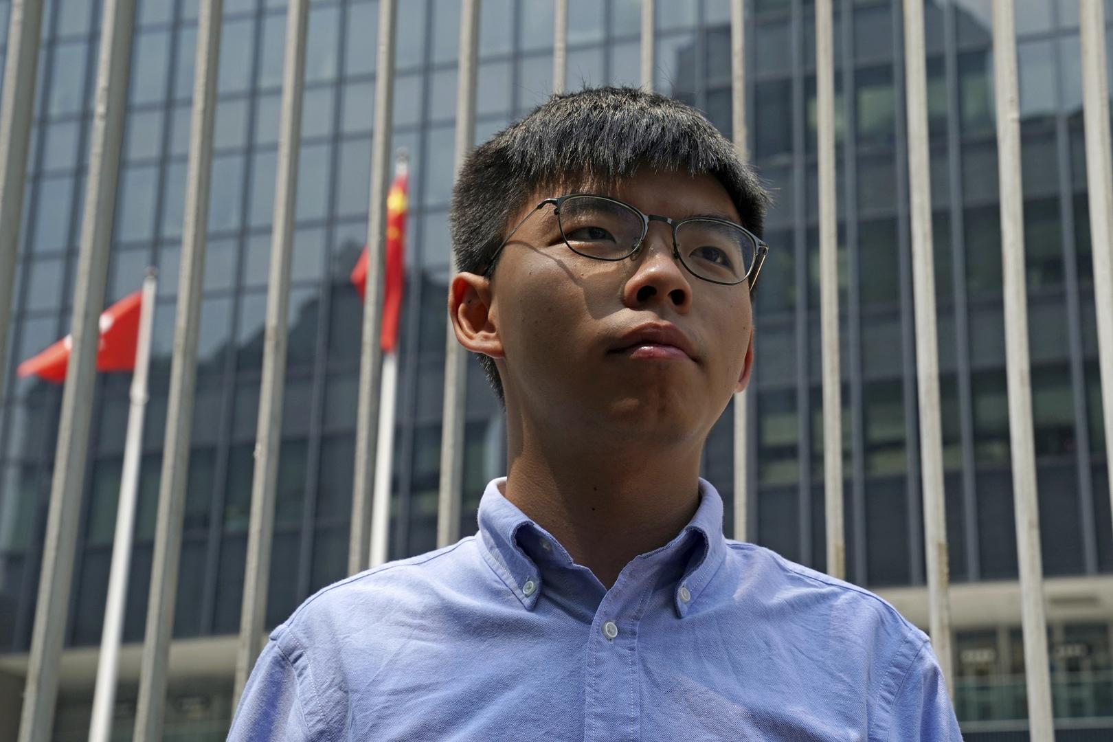 Hong Kong democratic activist Joshua Wong speaks to the media in Hong Kong, Saturday, Sept. 28, 2019. Wong announced plans to contest local elections and warns that any attempt to disqualify him will only spur more support for monthslong pro-democracy pro