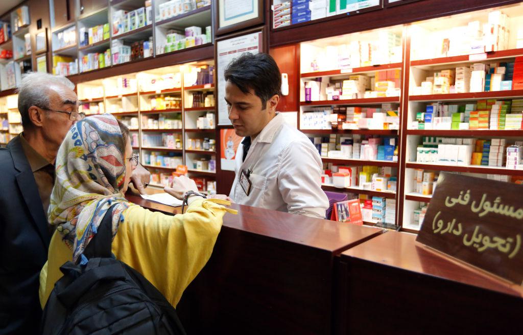 Iranians shop at a drugstore at the Nikan hospital in Tehran on September 11, 2018.