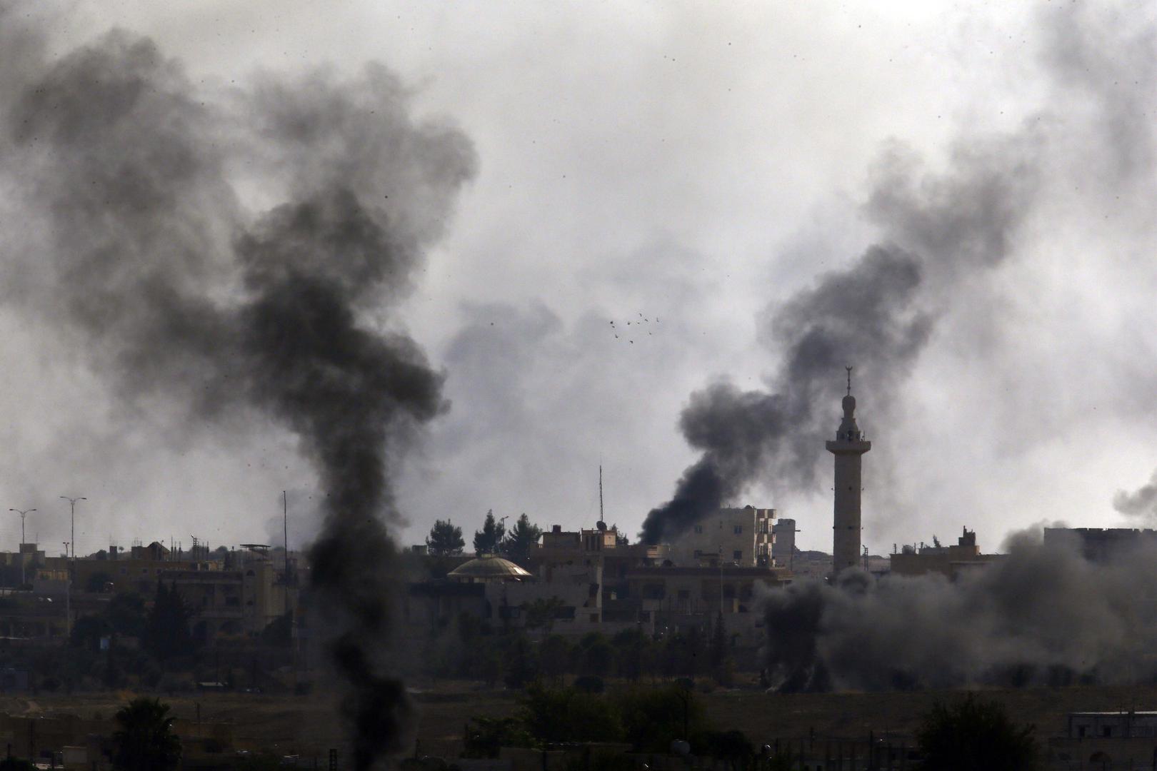 In this photo taken from the Turkish side of the border between Turkey and Syria, in Akcakale, Sanliurfa province, southeastern Turkey, smoke billows from targets inside Syria during bombardment by Turkish forces Thursday, Oct. 10, 2019.