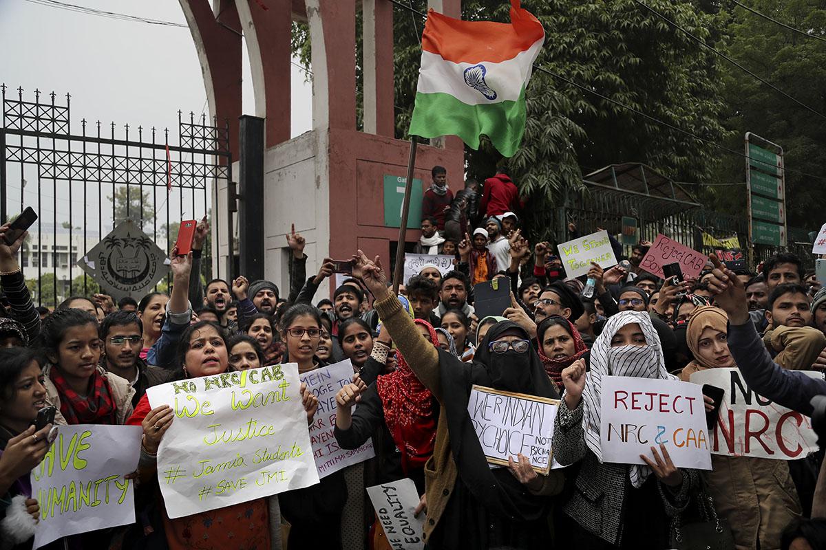 Indian students of the Jamia Millia Islamia University shout slogans during a protest, in New Delhi, India, Tuesday, Dec. 17, 2019.