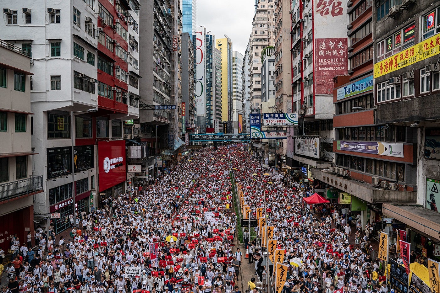 Protesters march on a street during a rally against the extradition law proposal on June 9, 2019 in Hong Kong. 