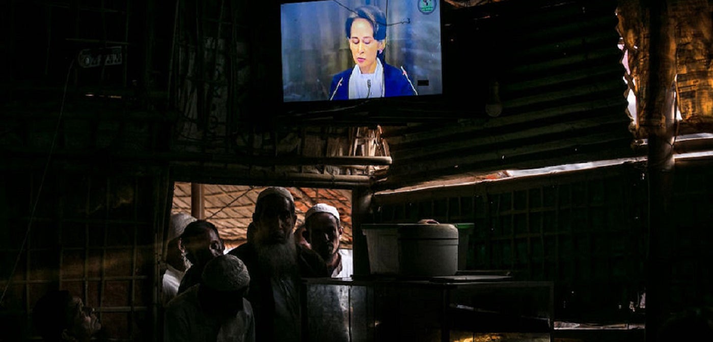 Rohingya refugees watch ICJ proceedings at a restaurant in a refugee camp on December 12, 2019 in Cox's Bazar, Bangladesh.