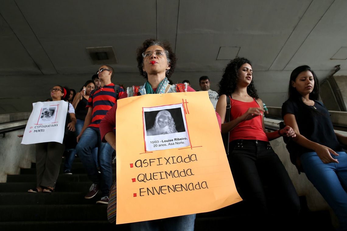 Women protest against gender-based violence in Brasilia, Brazil, in 2016.