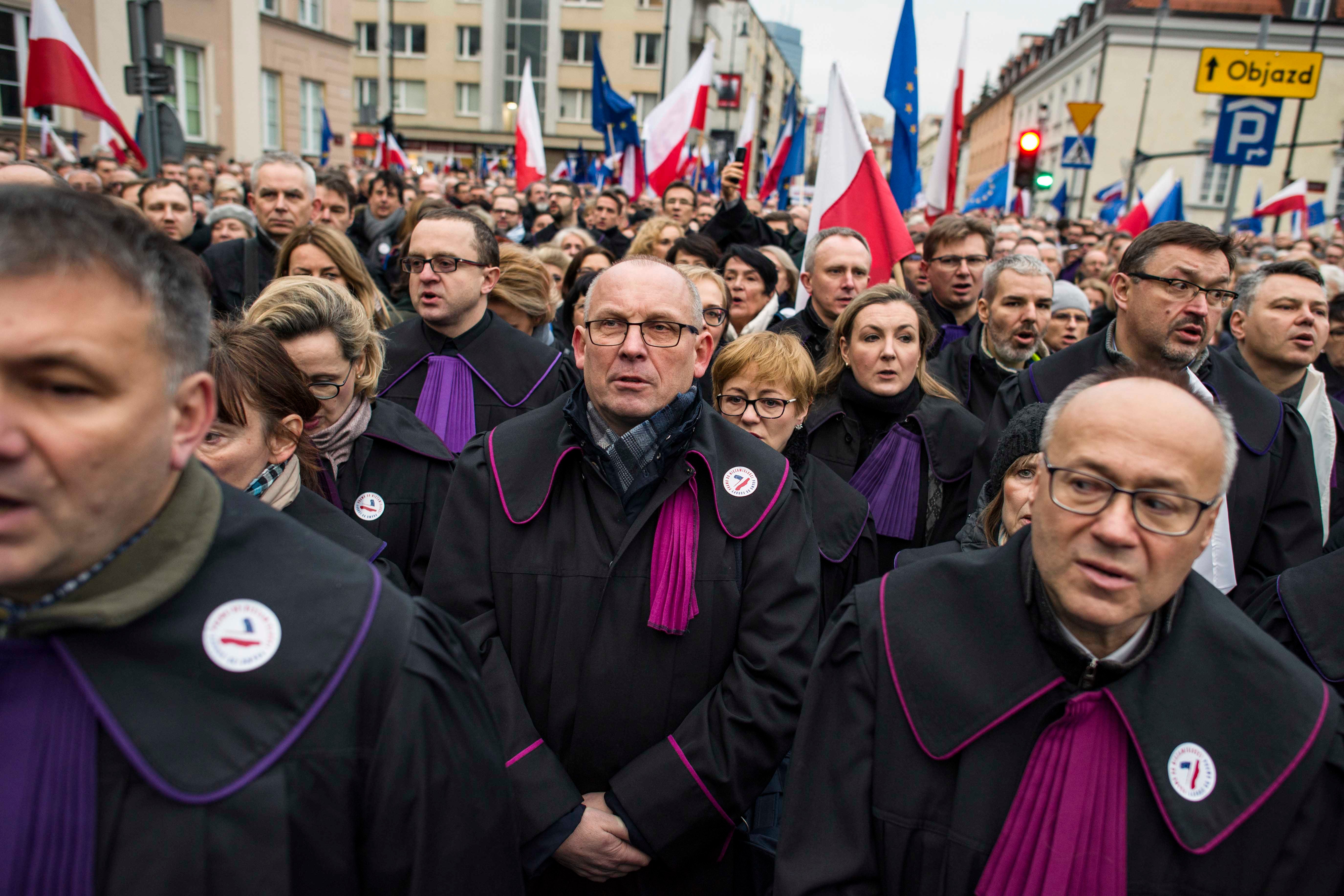 Polish judges, joined by judges from other European countries, wear their robes during a January 11 protest against proposed reforms that would undermine judicial independence. 