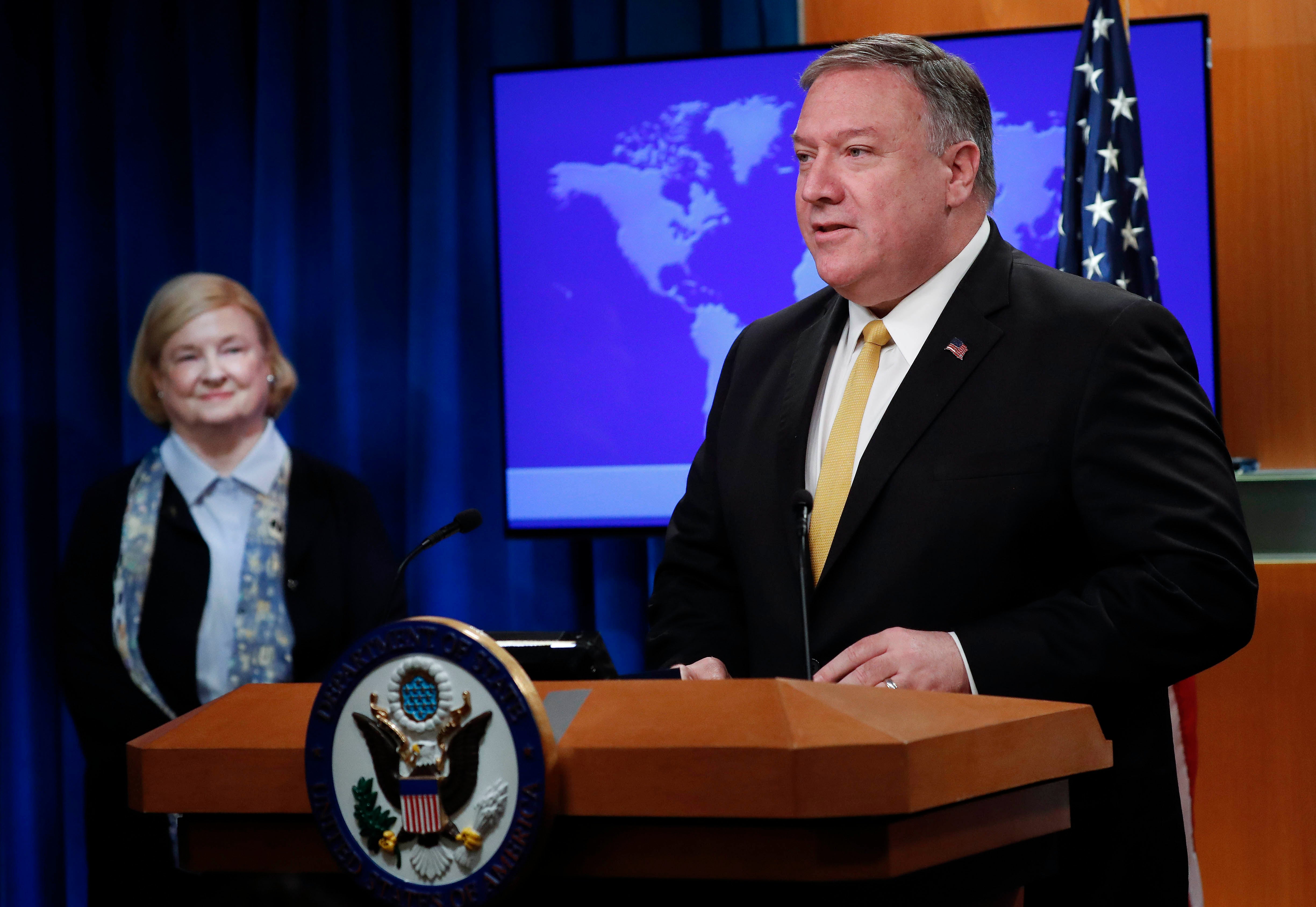 US Secretary of State Mike Pompeo, right, unveils the creation of Commission on "Unalienable" Rights, headed by Mary Ann Glendon, left, a Harvard Law School professor and a former U.S. Ambassador to the Holy See, during an announcement at the US State Dep