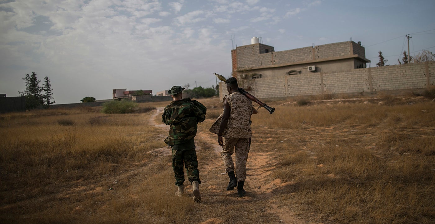 Government of National Accord fighters take positions during clashes with east-based fighters from the Libyan National Army at Al-Yarmouk frontline in Tripoli, Libya on August 29, 2019. 