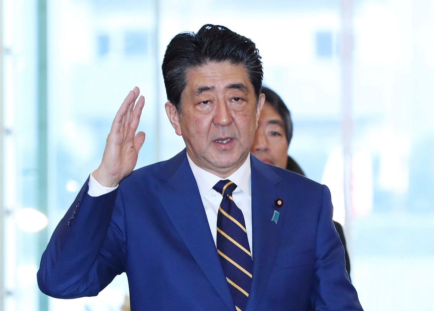 Japan's Prime Minister Shinzo Abe enters into the prime minister's office in Tokyo on January 20, 2020. House of Councilors Plenary session starts on the same day.