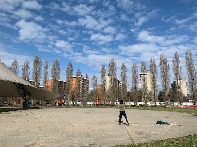 A lone juggler in a deserted park in Milan. Under the restrictions, people are allowed out to exercise by themselves. March 15, 2020.