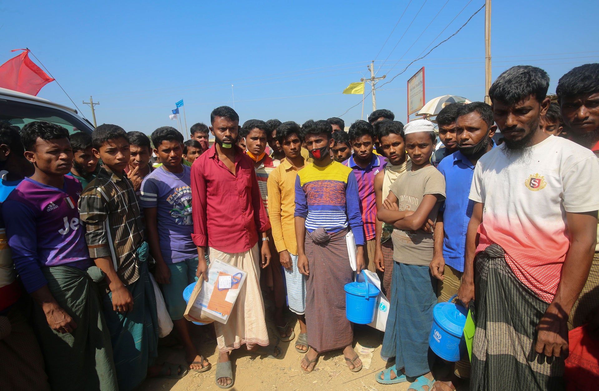 Rohingya refugees stand at the Kutupalong refugee camp, Cox’s Bazar, Bangladesh, April 1, 2020.