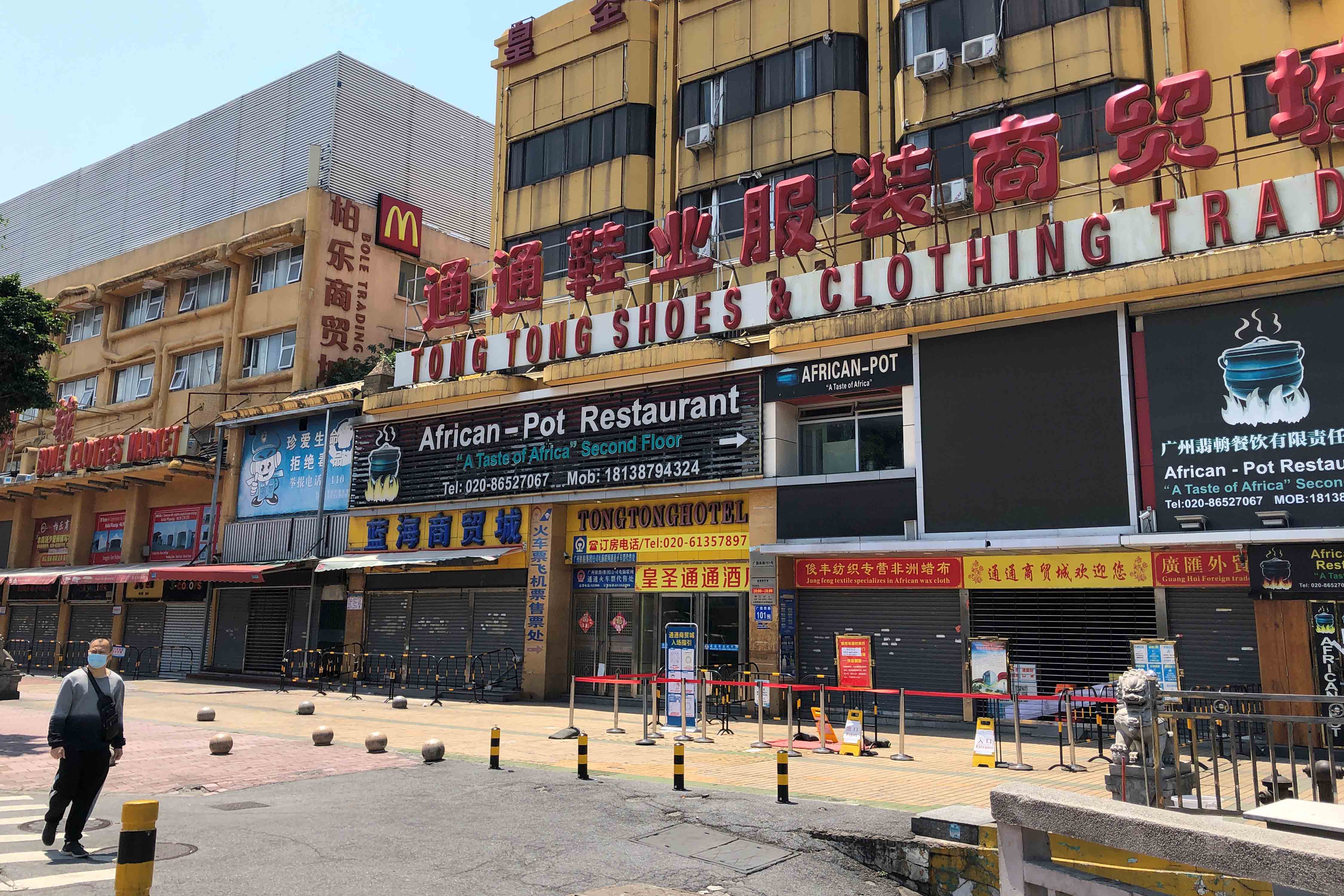 An African restaurant is closed off along with other businesses in Guangzhou's Sanyuanli area, where a neighborhood is in lockdown after several people tested positive for the novel coronavirus disease, in Guangzhou, Guangdong province, China, April 13, 2