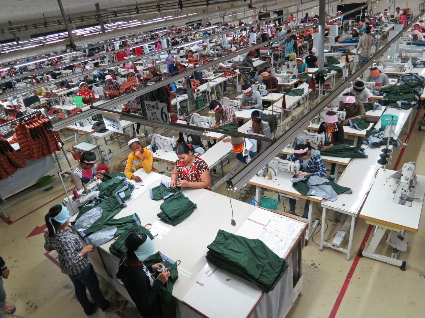 Women work in the sewing division of a factory in Phnom Penh, Cambodia's capital. Women constitute about 90 percent of the workforce in Cambodia's garment industry, which produces for many international apparel brands. Human Rights Watch has documented that workers in Cambodia frequently experience forced overtime, pregnancybased discrimination, and denial of paid maternity leave.