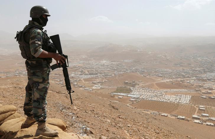 A Lebanese soldier at an army post in the hills above the Lebanese town of Arsal
