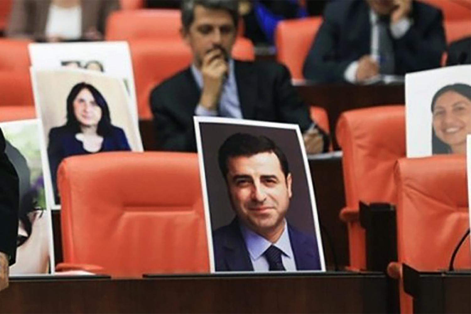 Selahattin Demirtaş, co-leader of the Peoples’ Democratic Party (HDP), was among MPs jailed on November 4, 2016. His vacant seat in the general assembly of the parliament was marked with his photo 
