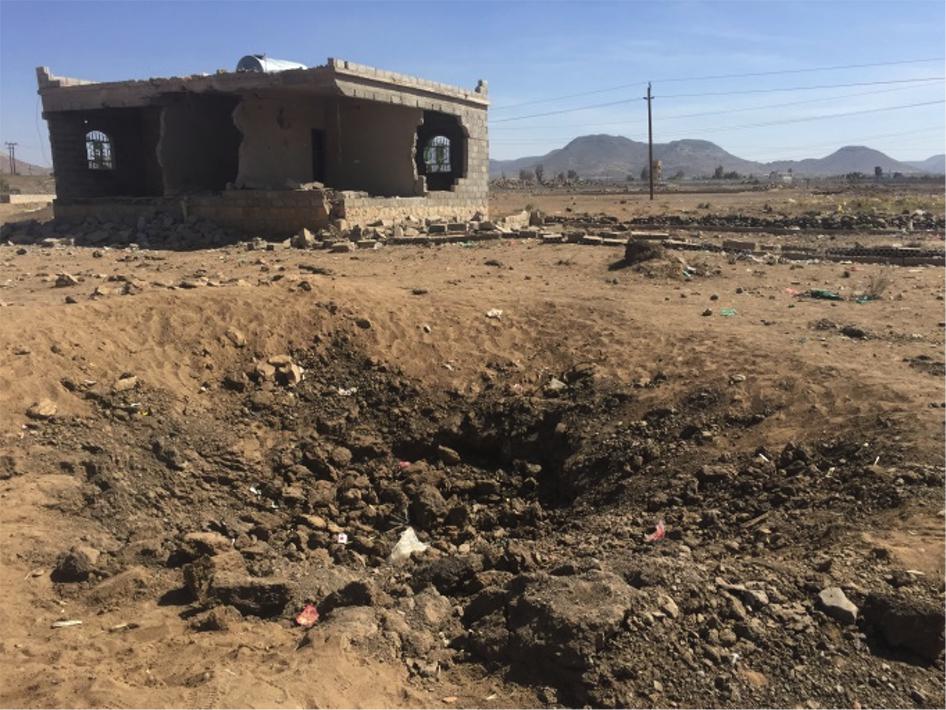 The crater left after an airstrike that wounded a woman and her son in the neighborhood of Thabwa in Sanaa, the capital, on October 26, 2015. 