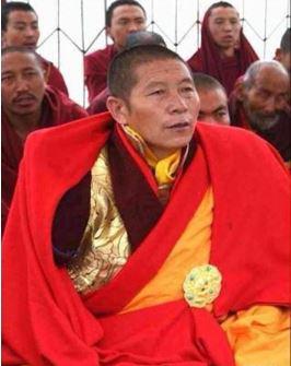 Foto personal de Jampel Wangchuk, monjo principal i disciplinari a Drepung Loseling, obtinguda pel Departament de Seguretat de l'Administració Central Tibetana.  Data desconeguda.