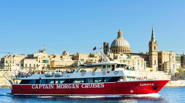 The Europa II, a tourist ferry sets sail from Marsamxett Harbour, Valletta, Malta.