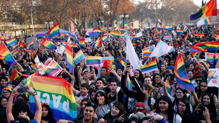People take part in the annual Pride parade in support of the LGBT community, in Santiago, Chile, on June 22, 2019.