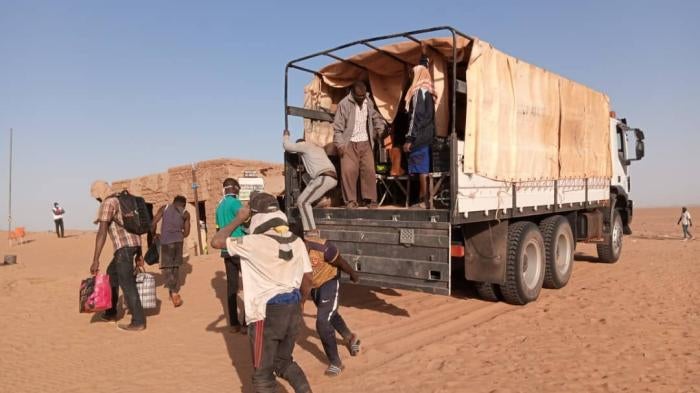 Migrants of several nationalities, part of a group of 270 people, arrive from Algeria to Assamaka, Niger, on September 30, 2020. © 2020 IOM Niger